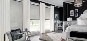 White and black bedroom with solar shades